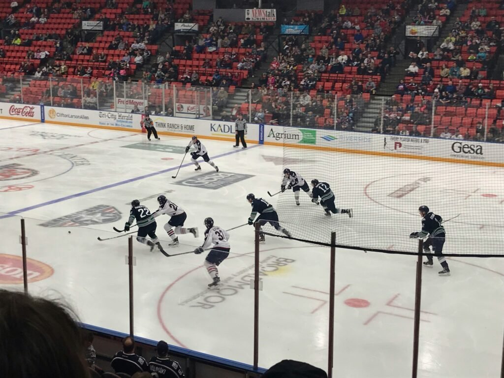 How long is a hockey game with players competing on an ice rink.