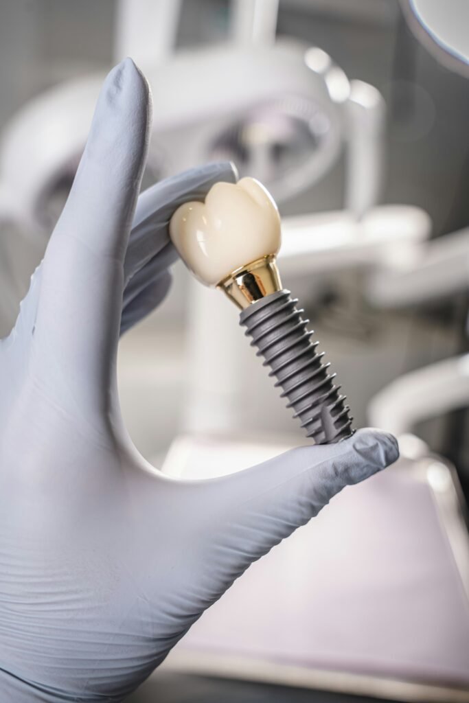 Why Are Dental Implants So Expensive? Real Cost Breakdown covering implant placement, dental fees, crowns, materials, imaging, and aftercare.