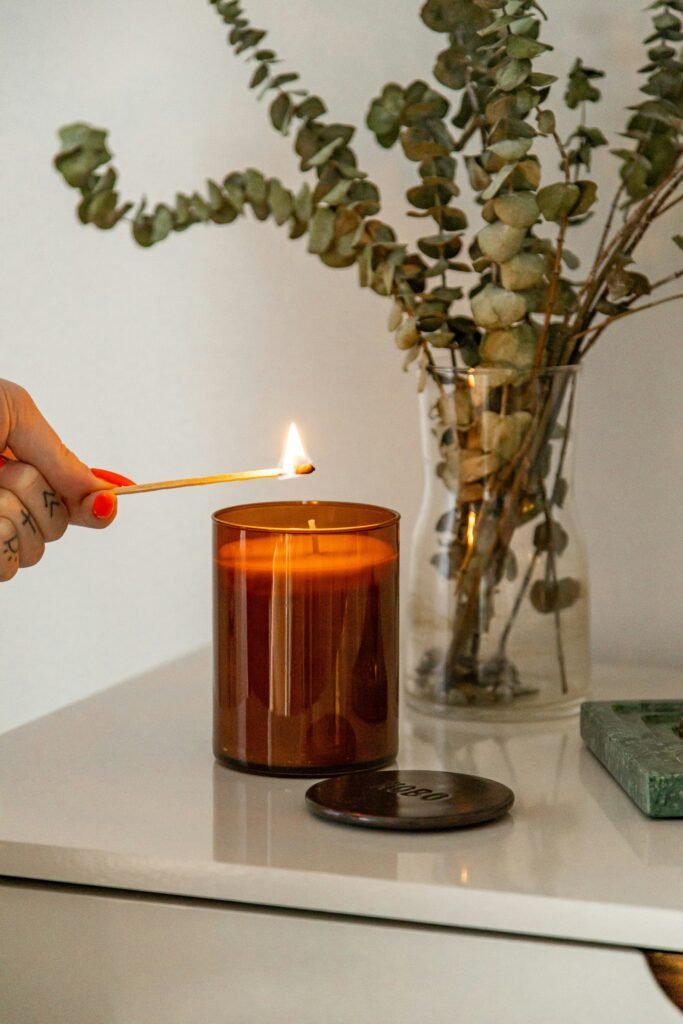 wax removal, glass cleaning, household methods, and candle jar reuse.