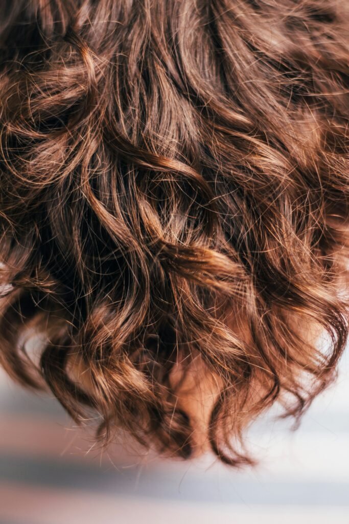 Why Does My Hair Smell Burnt? guide to burnt hair odor, heat exposure, product buildup, chemical damage, hair care, and prevention.
